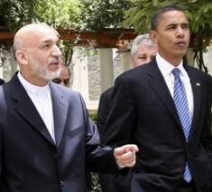 Karzai and Obama - two puppets walking