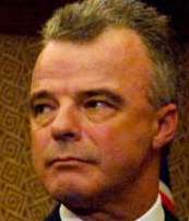 Minister of Defence, Brendan Nelson, displays naked ear