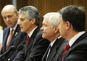 Spineless Smith (2nd left) scrutinised by Americans