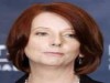 Oz PM and servile Washington lackey, Julia 'fishwife' Gillard