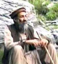 Bin Laden watches his boys in action from the rocks