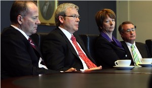 Lacklustre: Rudd flanked by deputy Gillard, Treasurer Swan and Finance Min. Tanner