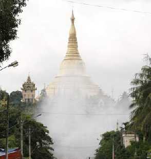 Smoke obscures the Golden Pagoda of Yangon