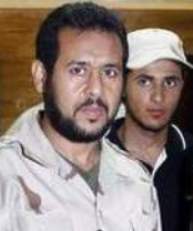 Paranoid Abdel Hakim Belhaj (left)